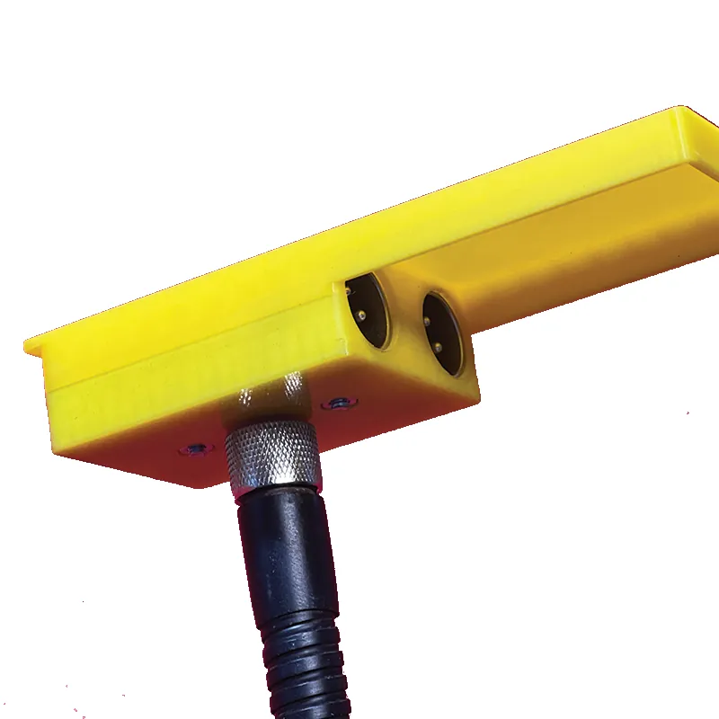 The yellow double barrel start sensor holder on a tripod mount